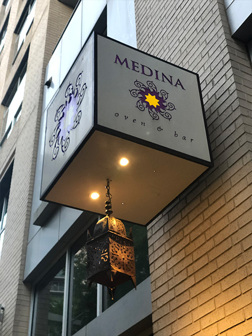 Medina Oven & Bar sign